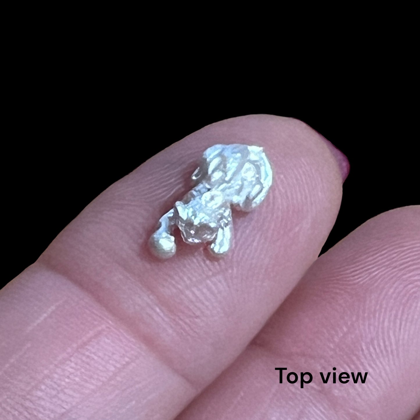 Kitten playing with ball Charm